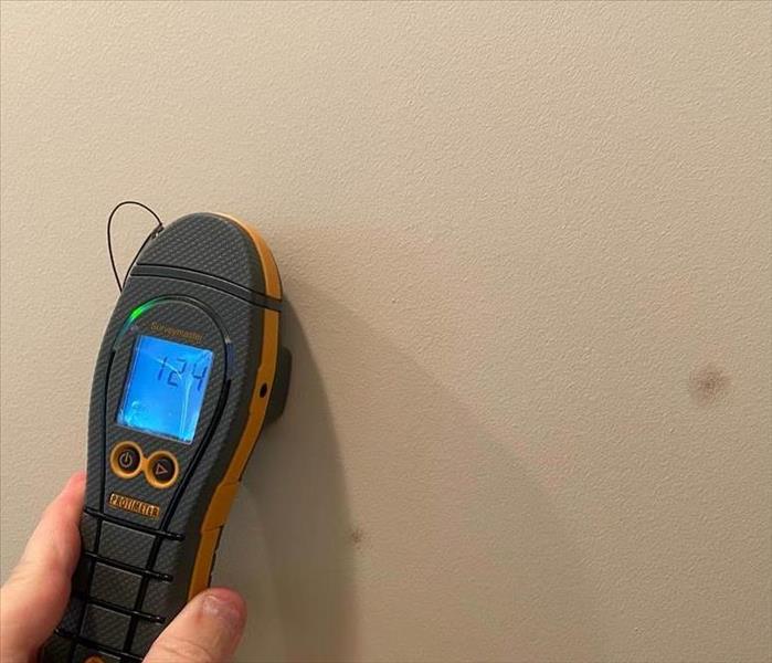 moisture meter on wall