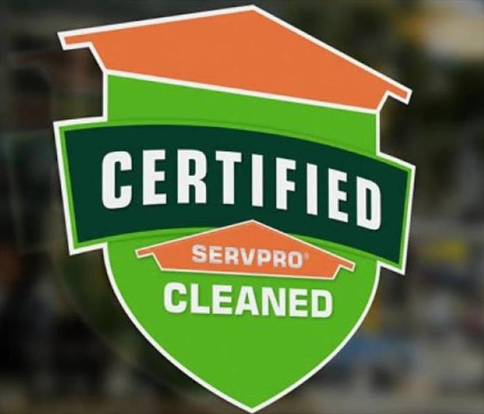 Certified: SERVPRO Cleaned sticker on a window