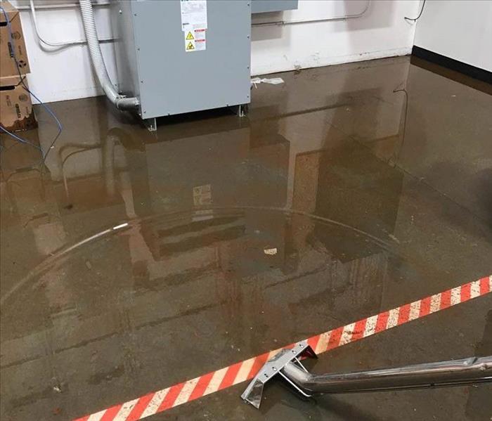 Water flooded in a warehouse room